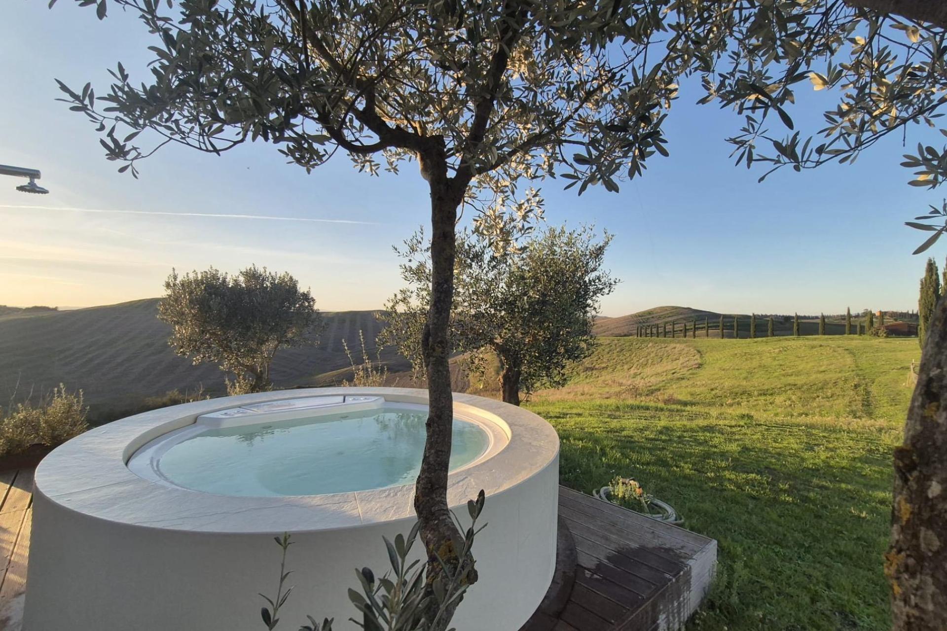 Kleinschallige agriturismo met uitzicht op Siena en de omringende heuvels