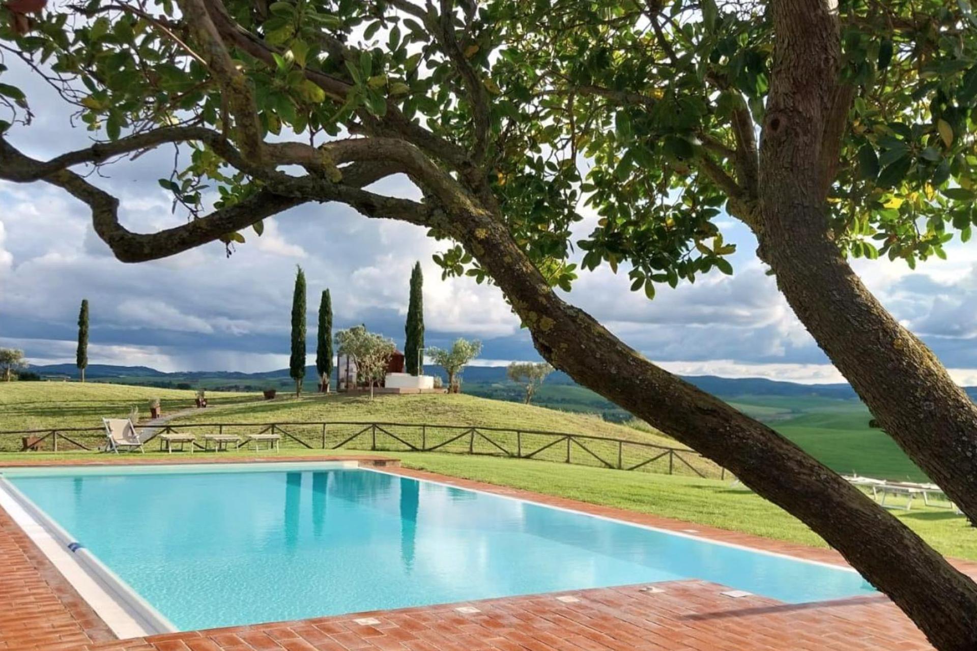 Kleinschallige agriturismo met uitzicht op Siena en de omringende heuvels